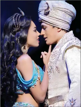  ??  ?? Plasticky romance: Jade Ewen as Jasmine with John-Wilson’s Aladdin