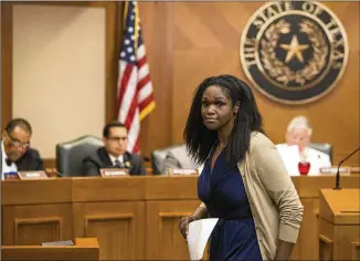  ?? JAY JANNER / AMERICAN-STATESMAN ?? Austin ISD Chief Financial Officer Nicole Conley Johnson appears at a House Public Education Committee hearing Monday at the Capitol. The committee’s House Bill 21 would increase per-student basic allotment to $5,350 from $5,140. The panel is expected to vote on the bill Tuesday.