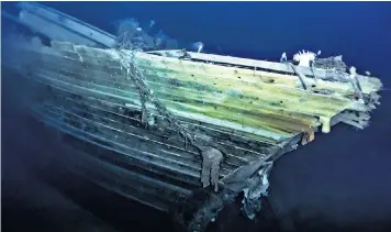  ?? ?? The first pictures of the wreck show the stern, top, the ship’s wheel, left, and the starboard bow, right. Endurance became trapped in the ice, below, and was abandoned by Shackleton, inset below, before it sank on Nov 21 1915