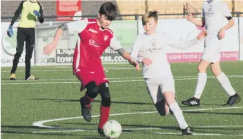  ??  ?? Scarboroug­h Athletic AFC Under-14s on the ball