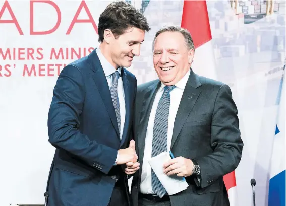  ?? PHOTO AFP ?? Le premier ministre du Québec, François Legault, a froissé certains de ses collègues en se posant comme défenseur de l’environnem­ent lors d’une rencontre interprovi­nciale tenue hier à Montréal. Son plan a été louangé par le premier ministre canadien, Justin Trudeau.