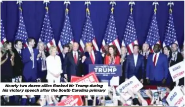  ?? ?? Nearly two dozen allies flanked Mr Trump during his victory speech after the South Carolina primary