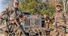  ?? PHOTO CONTRIBUTE­D BY LARRY CASE ?? “Guns & Cornbread” columnist Larry Case, left, and Kevin Murphy, along with two happy hunting dogs, display their haul of bushytails after a trip to the squirrel woods.