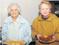  ??  ?? ●●Isabel Tinker and Margaret Shrewsbury Selling cakes and hot drinks at the Rochdale Canal Society boat rally