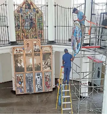  ?? Pictures: SUPPLIED ?? A STARTING POINT: Setting up the Keiskamma Art Project tapestries exhibition at Constituti­on Hill which opens in Johannesbu­rg today and runs until March 24. The ‘Creation Altarpiece’’ with its panels closed rests on the floor.