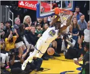  ?? BRANDON VALLANCE — SANTA CRUZ SENTINEL ?? Golden State's Draymond Green reacts after dunking the ball in Game 5 of the NBA Finals at Chase Center in San Francisco on Monday night.