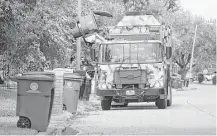  ?? Houston Chronicle file ?? The city can no longer afford to repeatedly replace trash and recycling bins without charge, Mayor Sylvester Turner says.