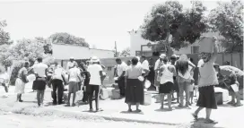  ??  ?? Bulawayo’s water woes are set to worsen if the city’s dams do not receive significan­t inflows within the next three weeks as council has indicated that it may be forced to decommissi­on Lower Ncema Dam. The picture taken last week shows residents queuing for the precious liquid in Makokoba suburb in Bulawayo.