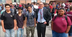  ?? Photo by Joseph B. Nadeau ?? From left: Kevin Silva, Carlos Rosa, Jeremy Gonzalez and Khari Perry, at right, talk with Superinten­dent Patrick McGee.