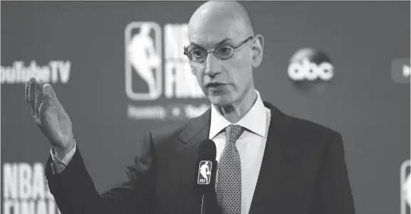  ?? PHOTOS: LACHLAN CUNNINGHAM/GETTY IMAGES ?? Commission­er Adam Silver says the NBA should share in gambling revenues to pay for increased enforcemen­t measures and as a royalty.