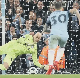  ??  ?? Manchester City goalkeeper Willy Caballero save a penalty from Monaco’s Radamel Falcao