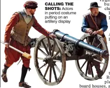  ??  ?? CALLING THE
SHOTS: Actors in period costume putting on an artillery display