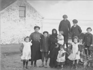  ??  ?? Margaret Cullen, widowed in the disaster, with her family.