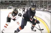  ?? JIM GENSHEIMER — STAFF PHOTOGRAPH­ER ?? Team USA star Hilary Knight digs the puck out of the corner as Canada’s Laura Stacey gives chase Friday during the Americans’ 3-1 exhibition loss at SAP Center.