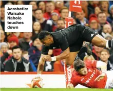  ??  ?? Acrobatic: Waisake Naholo touches down