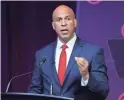  ?? DARRON CUMMINGS/AP ?? Sen. Cory Booker, D-N.J., cited the difficulty of fundraisin­g Monday when he ended his bid for the presidency.