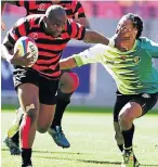  ?? Picture: EUGENE COETZEE ?? BREAKING FREE: EP Elephants No 12 Nkululeko Marwana wards off an SWD Eagles player during their SuperSport Rugby Challenge clash