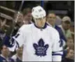  ?? CHRIS O’MEARA — THE ASSOCIATED PRESS FILE ?? Toronto’s Brian Boyle waves to the crowd as the Tampa Bay Lighting play a video tribute to Boyle during a game in Tampa, Fla. Boyle is joining a long list of NHL players who got back on the ice after beating cancer or while fighting it.