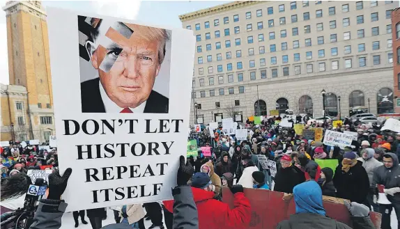 ?? AP ?? Protesters have been rallying against President Trump’s immigratio­n order in Cleveland and other American cities.