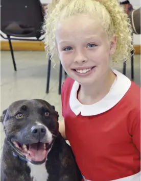  ?? Picture: Phil Creighton ?? Ella Newborough’s Annie is teaming up with Gabriel the dog – playing Sandy – for Reading Operatic Society’s autumn show