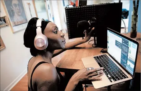  ?? ERIN HOOLEY/CHICAGO TRIBUNE ?? Lanise Antoine Shelley prepares to record her podcast “When TheyWere Young” in her home in Chicago. The podcast, and her new play “Pretended” at the Paramount Theatre in Aurora, are both on the subject of adoption.