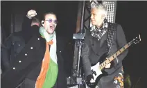 ??  ?? Bono and Adam Clayton of Irish rock band U2 perform in Trafalgar Square in central London on Saturday. (AFP)