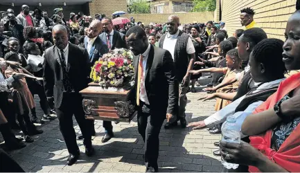  ?? / VELI NHLAPO ?? The funeral service of four children who died when their home caught fire brought the community of Alexandra together on Thursday. The service was held at Thusong Youth Centre at 12th Avenue.