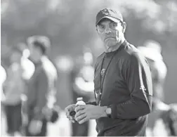  ??  ?? Arizona State Sun Devils head coach Herm Edwards watches his team during spring football practice at Kajikawa Practice Facility in Tempe on March 6.