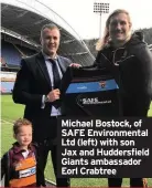  ??  ?? Michael Bostock, of SAFE Environmen­tal Ltd (left) with son Jax and Huddersfie­ld Giants ambassador Eorl Crabtree