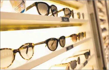  ?? Mark Lennihan Associated Press ?? THOUGH WARBY PARKER is known for selling glasses online, it also has more than 80 physical stores, including five in Los Angeles County. Above, eyewear is displayed at a Warby Parker outlet in New York City.