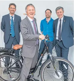  ?? Picture: Steven Brown. ?? Paul Lewis of Scottish Enterprise, government minister Ivan McKee, Ian Byrne of Cyclotrici­ty and Councillor Altany Craik with a Cyclotrici­ty e-bike.