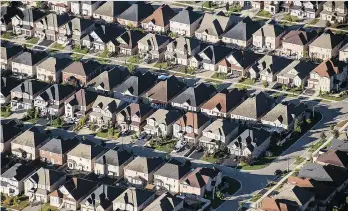  ?? JAMES MACDONALD/BLOOMBERG ?? The decline in home sales “is largely payback” for buyers rushing to sign deals ahead of new mortgage rules in January, says Robert Kavcic, senior economist at BMO Capital Markets.