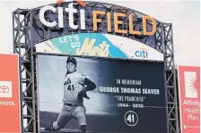  ?? KATHY WILLENS/ASSOCIATED PRESS ?? A tribute to ex-Met Tom Seaver is displayed on the scoreboard at Citi Field before the Mets’ game Thursday vs. the Yankees. Seaver, who died Wednesday at age 75, starred for the 1969 Miracle Mets.