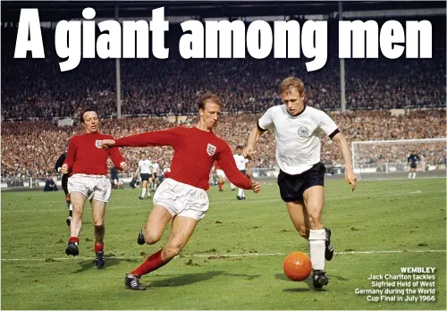  ??  ?? WEMBLEY Jack Charlton tackles Sigfried Held of West Germany during the World Cup Final in July 1966