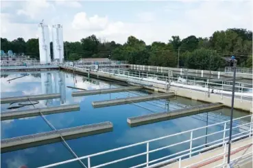  ?? AP PHOTO/ROGELIO V. SOLIS ?? Clouds are reflected in the city of Jackson’s O.B. Curtis Water Treatment Facility’s sedimentat­ion basins Sept. 2 in Ridgeland, Miss.