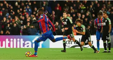  ?? — Reuters ?? Muffed: Crystal Palace’s Christian Benteke misses a chance to score from a penalty against Bournemout­h at Selhurst Park on Saturday.