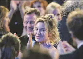  ??  ?? RENÉE ZELLWEGER added to her trophy haul Sunday with her SAG win and is widely expected to take the lead actress Oscar too for her work in “Judy.”