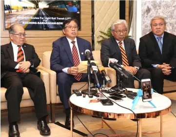  ??  ?? Abang Johari (third right), flanked by (from right) Awang Tengah, Masing and Uggah, speaking to reporters. — Photo by Chimon Upon