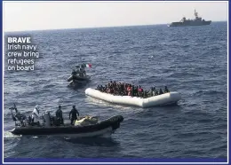  ??  ?? BRAVE Irish navy crew bring refugees on board