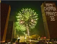  ?? Lori Van Buren / Times Union ?? Fireworks, like these in 2019, will return to Empire State Plaza in Albany after a year marked by a global pandemic that made large gatherings dangerous.