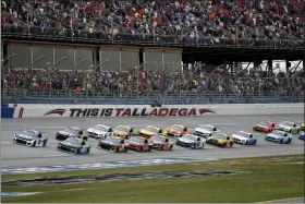  ?? BUTCH DILL — THE ASSOCIATED PRESS ?? Chase Elliott (9) leads the pack to the start line for a NASCAR Cup Series auto race at Talladega Superspeed­way in Talladega, Ala., Sunday.