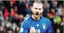  ?? (AP) ?? Italy’s Leonardo Bonucci reacts after scoring a penalty kick during the Euro 2020 soccer championsh­ip semifinal match between Italy and Spain at Wembley Stadium in London, England.