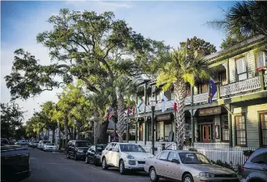  ?? COURTESY OF AMERLIA ISLAND TOURIST DEVELOPMEN­T COUNCIL ?? Old-time charm can easily be found on Amelia Island’s Fernandina Beach main street.