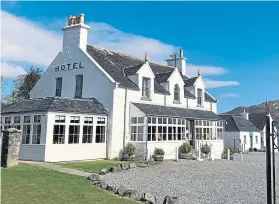  ?? ?? The sun shines on the pretty whitewashe­d Hotel Eilean Iarmain.