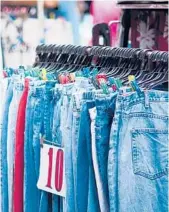  ?? DREAMSTIME ?? Head for the pants racks first when shopping at a thrift store, says Answer Angel Ellen Warren.