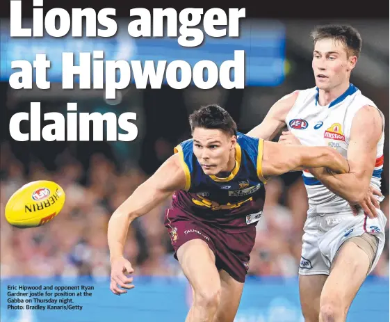  ?? Photo: Bradley Kanaris/getty ?? Eric Hipwood and opponent Ryan Gardner jostle for position at the Gabba on Thursday night.