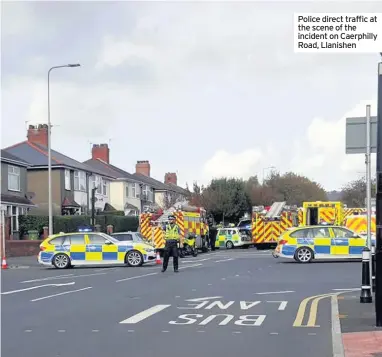  ??  ?? Police direct traffic at the scene of the incident on Caerphilly Road, Llanishen
