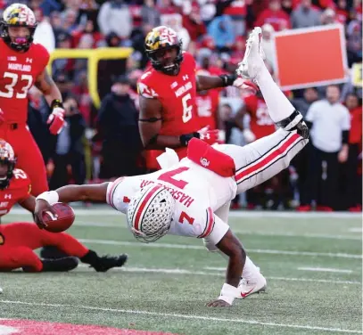  ?? GETTY IMAGES ?? Ohio State quarterbac­k Dwayne Haskins lunges across the goal line for a touchdown Saturday against Maryland.