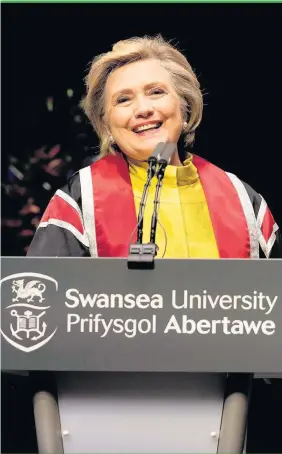  ?? Matthew Horwood ?? > Hillary Clinton speaks after being presented with an honorary doctorate of law at Swansea University on Saturday