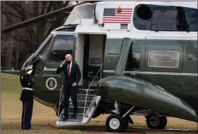  ?? (The New York Times/Anna Moneymaker) ?? President Joe Biden salutes as he steps off Marine One at the White House on Friday after visiting with wounded military personnel at Walter Reed National Military Medical Center in Bethesda, Md. Biden’s push for a $15 hourly minimum wage is drawing resistance from lawmakers considerin­g new covid-19 relief measures.